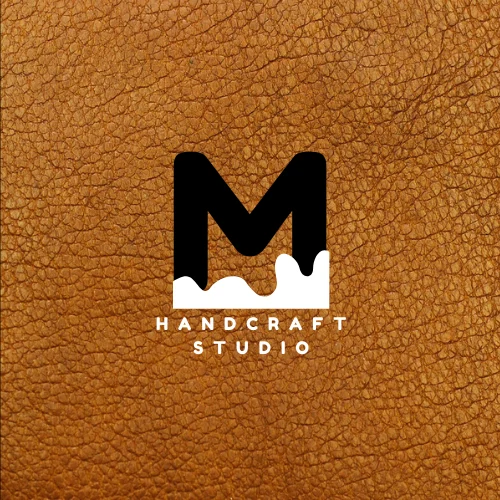 MenHandCraftStudio logo on brown leather texture