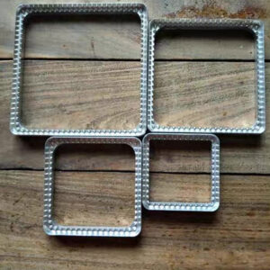 Hand-carved leather stamp set with square edge pattern tools