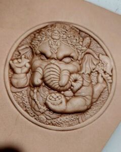 God of Wealth leather stamp mold impression on real leather