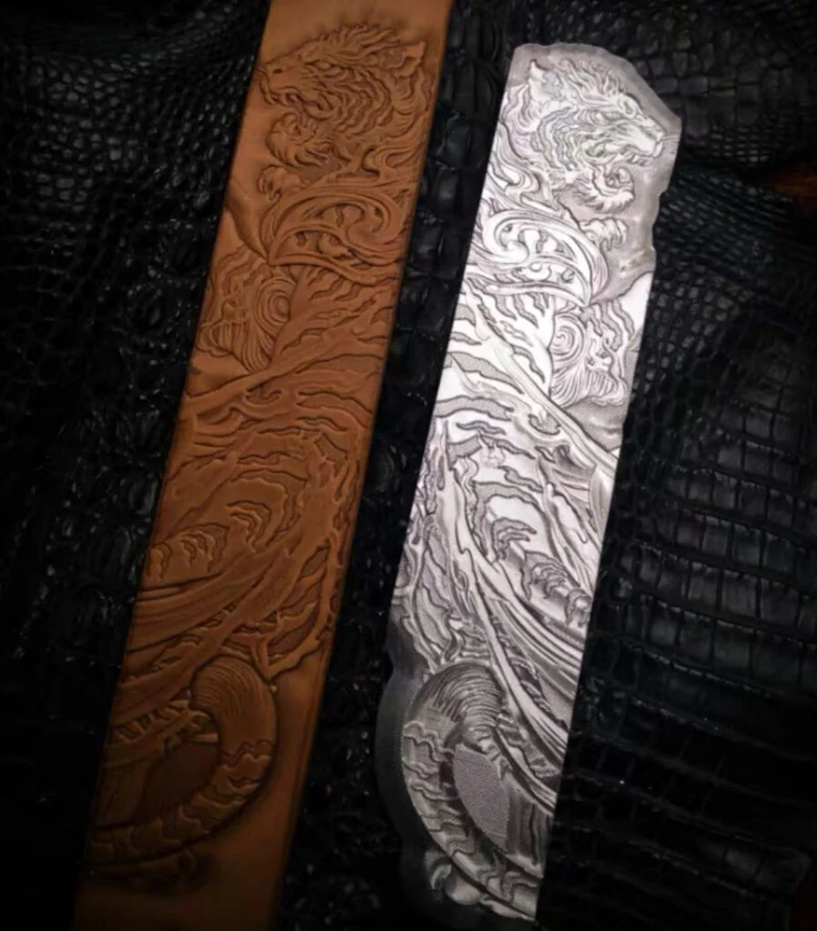 Tiger leather stamp mold in A212 duralumin with embossed leather sample