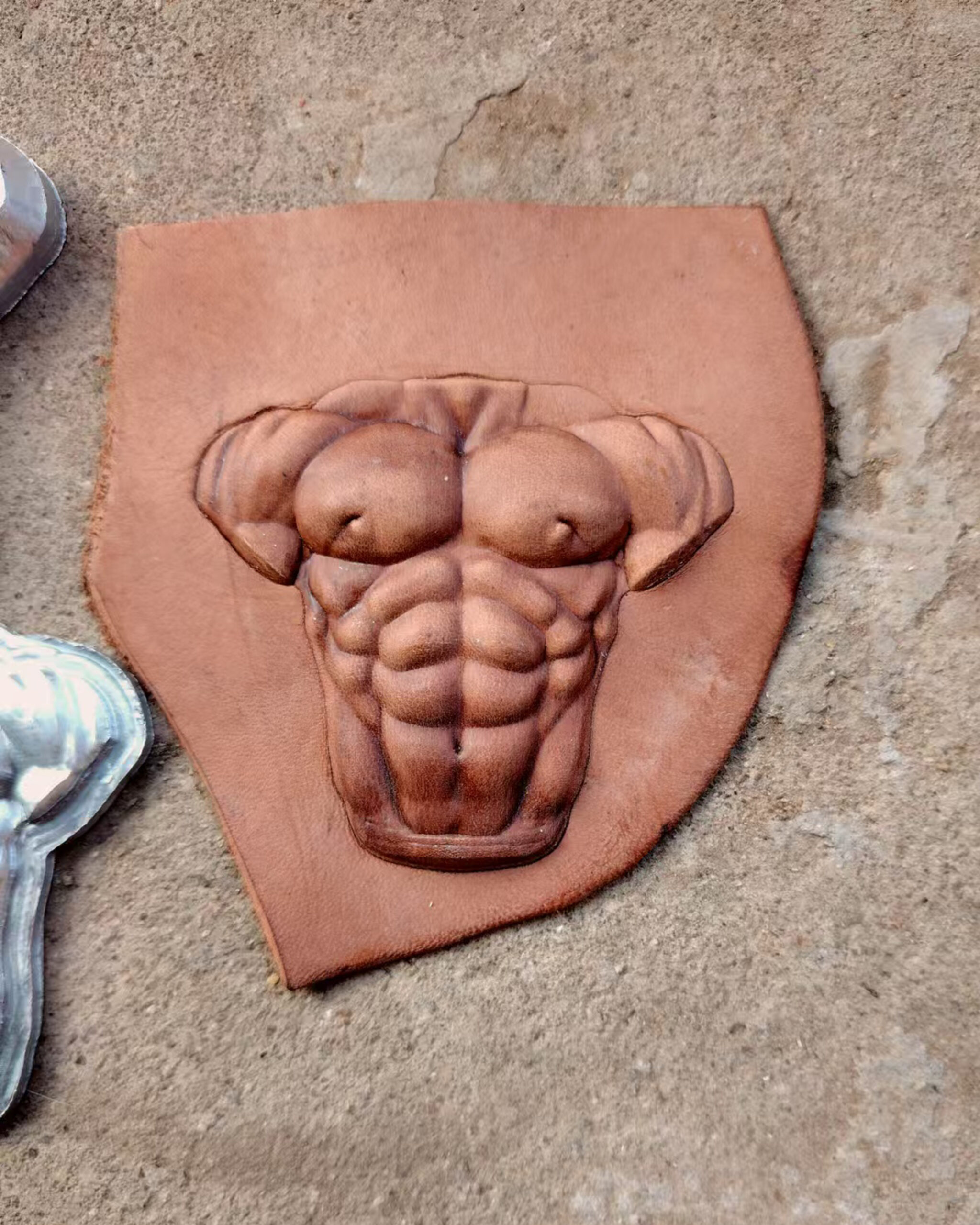 Muscle Man leather stamp mold impressions on real leather