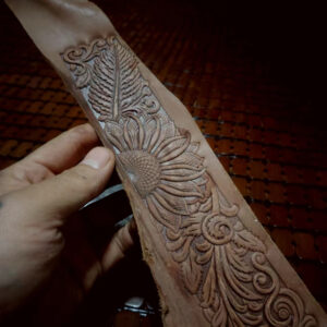 Handcrafted sunflower leather stamp mold embossed on leather panel