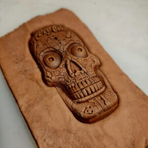 3D skull leather embossing mold with pressed leather sample