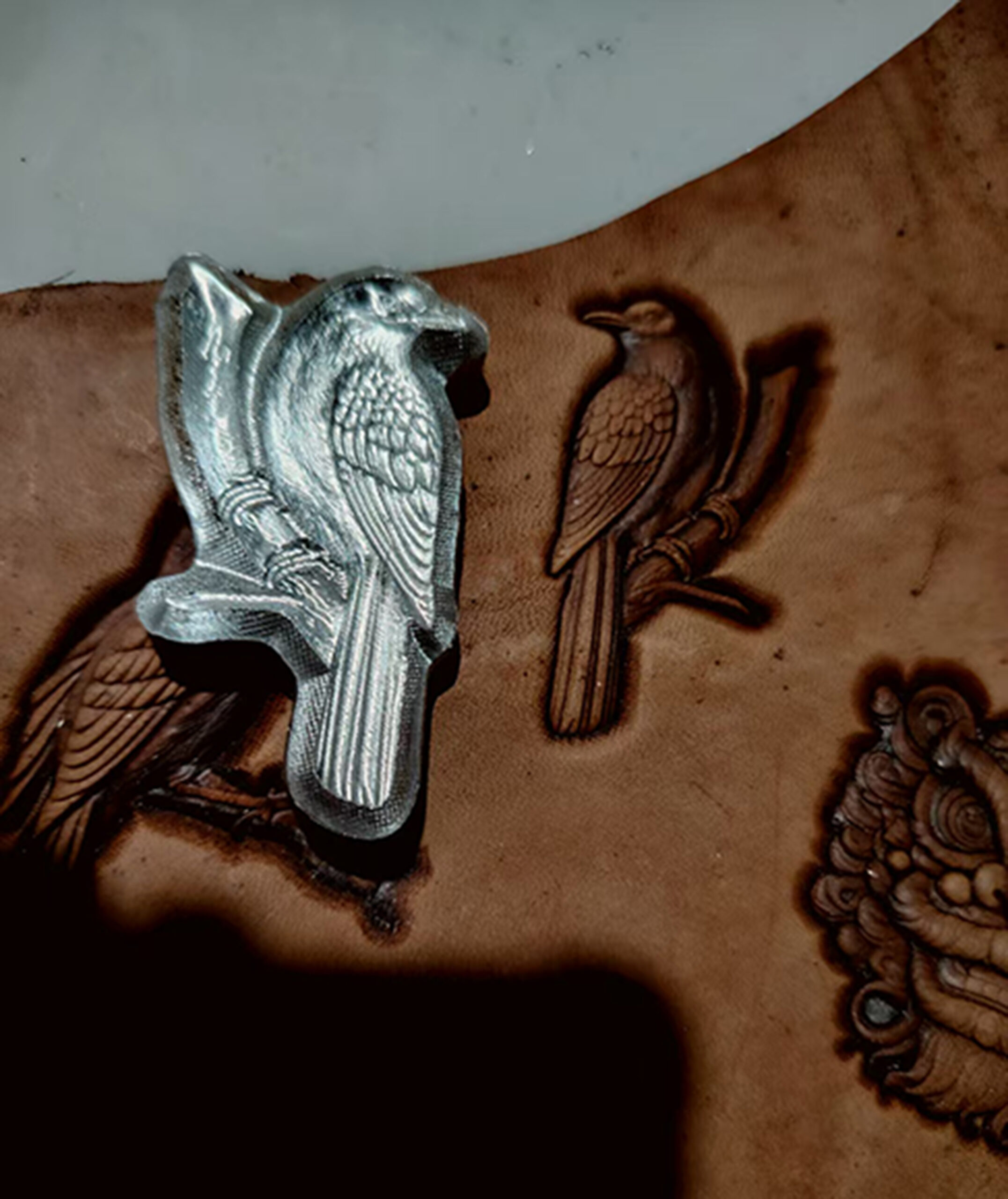 bird leather stamp impression on vegetable tanned leather