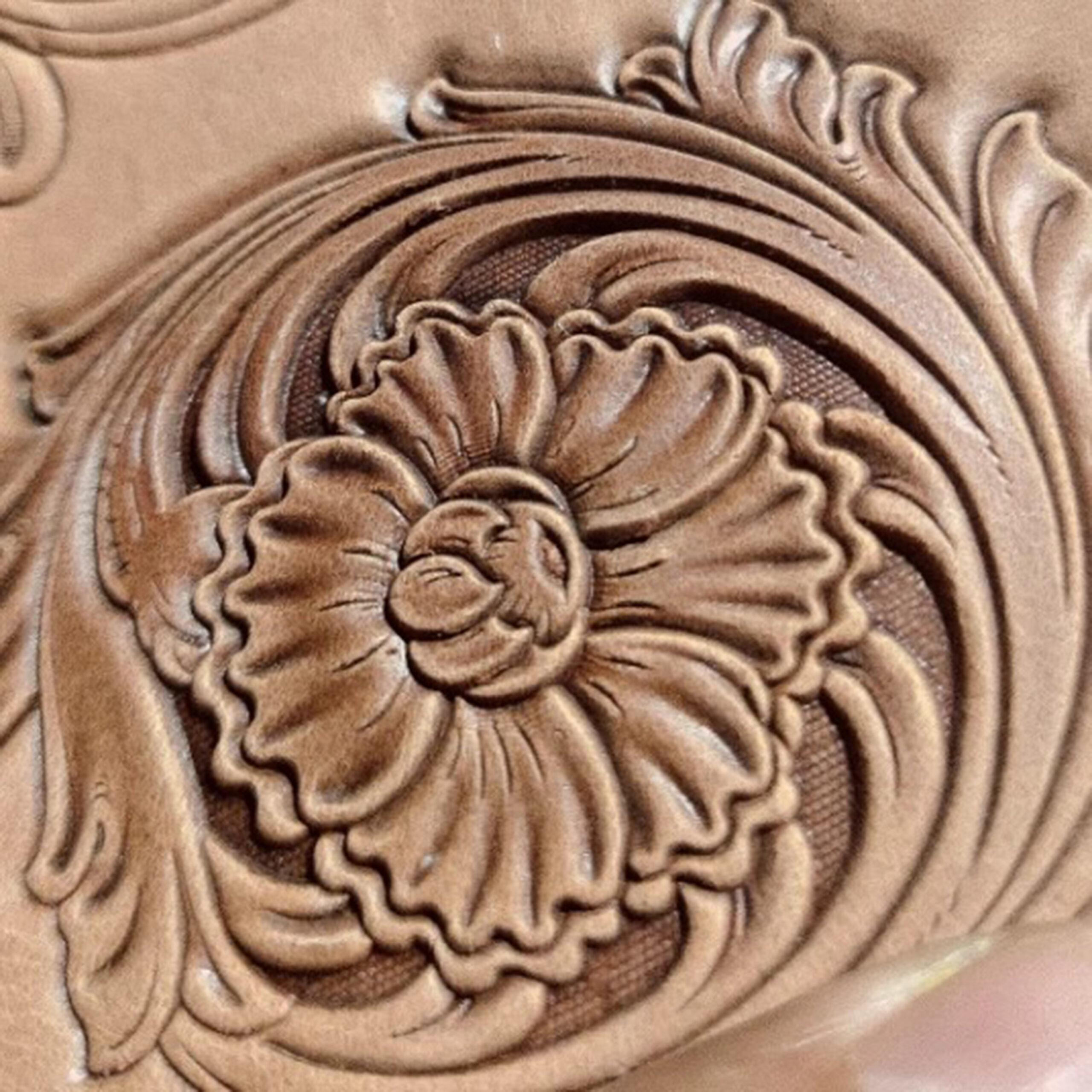 Corner floral leather stamp mold with embossed vegetable-tanned leather sample