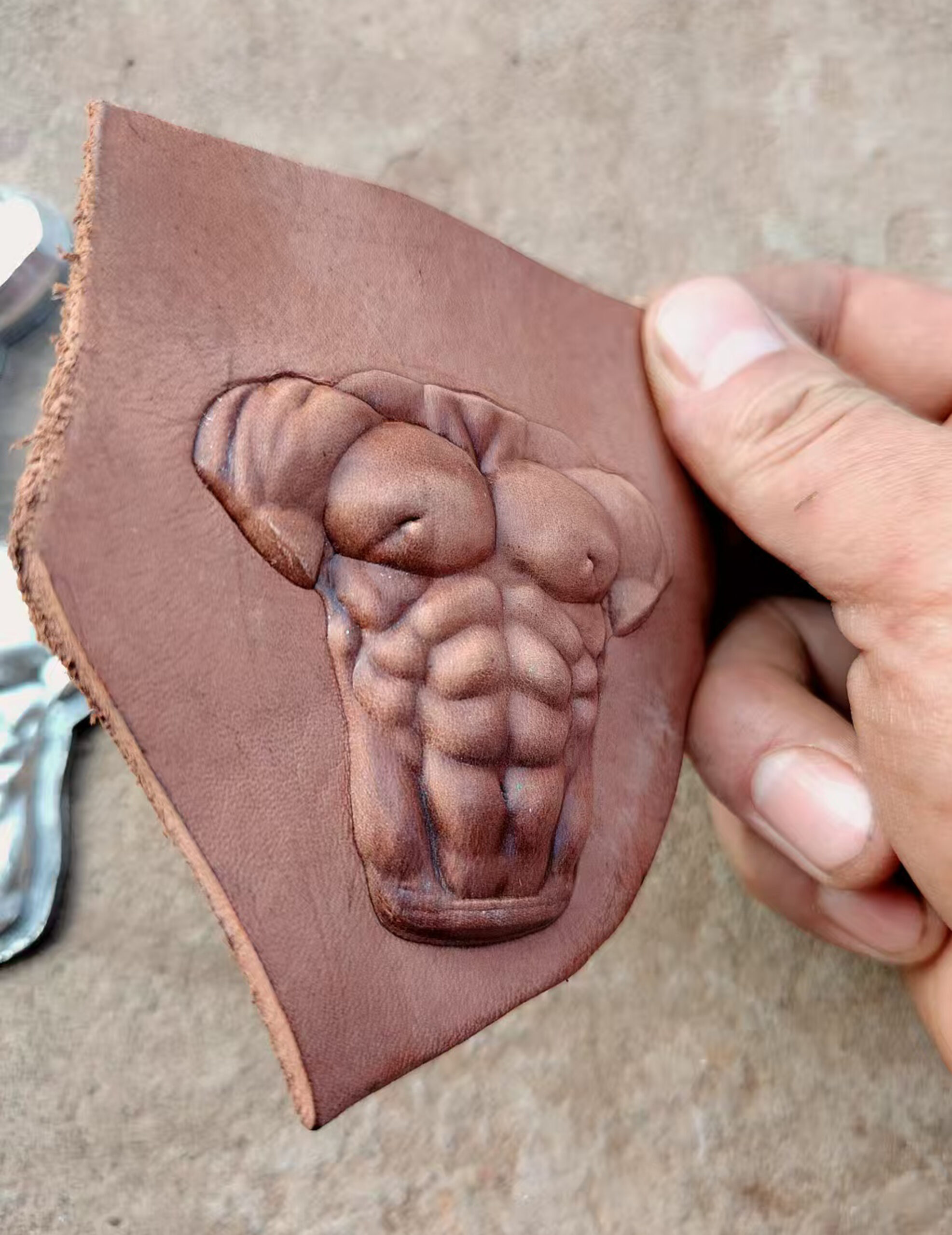 Muscle Man leather stamp mold impressions on real leather
