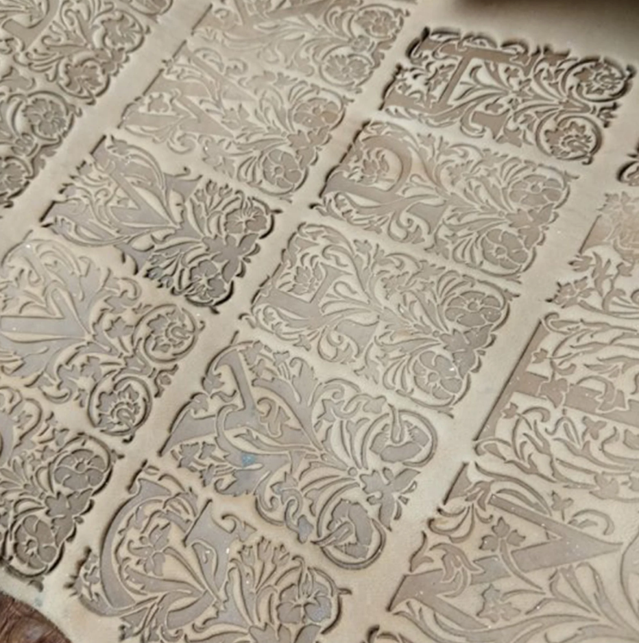 floral alphabet leather stamp impression on vegetable tanned leather