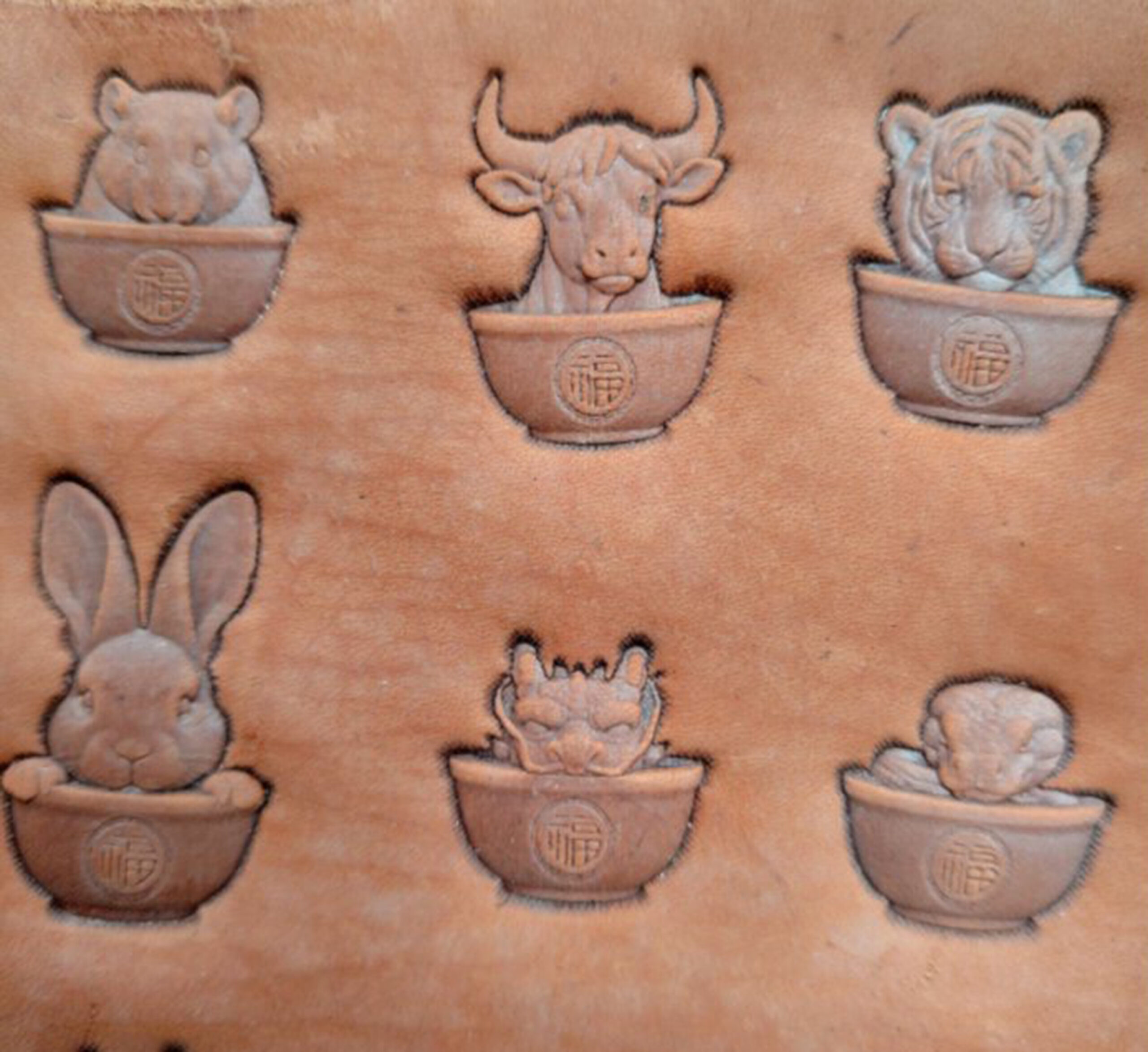 zodiac leather stamp impression on vegetable tanned leather