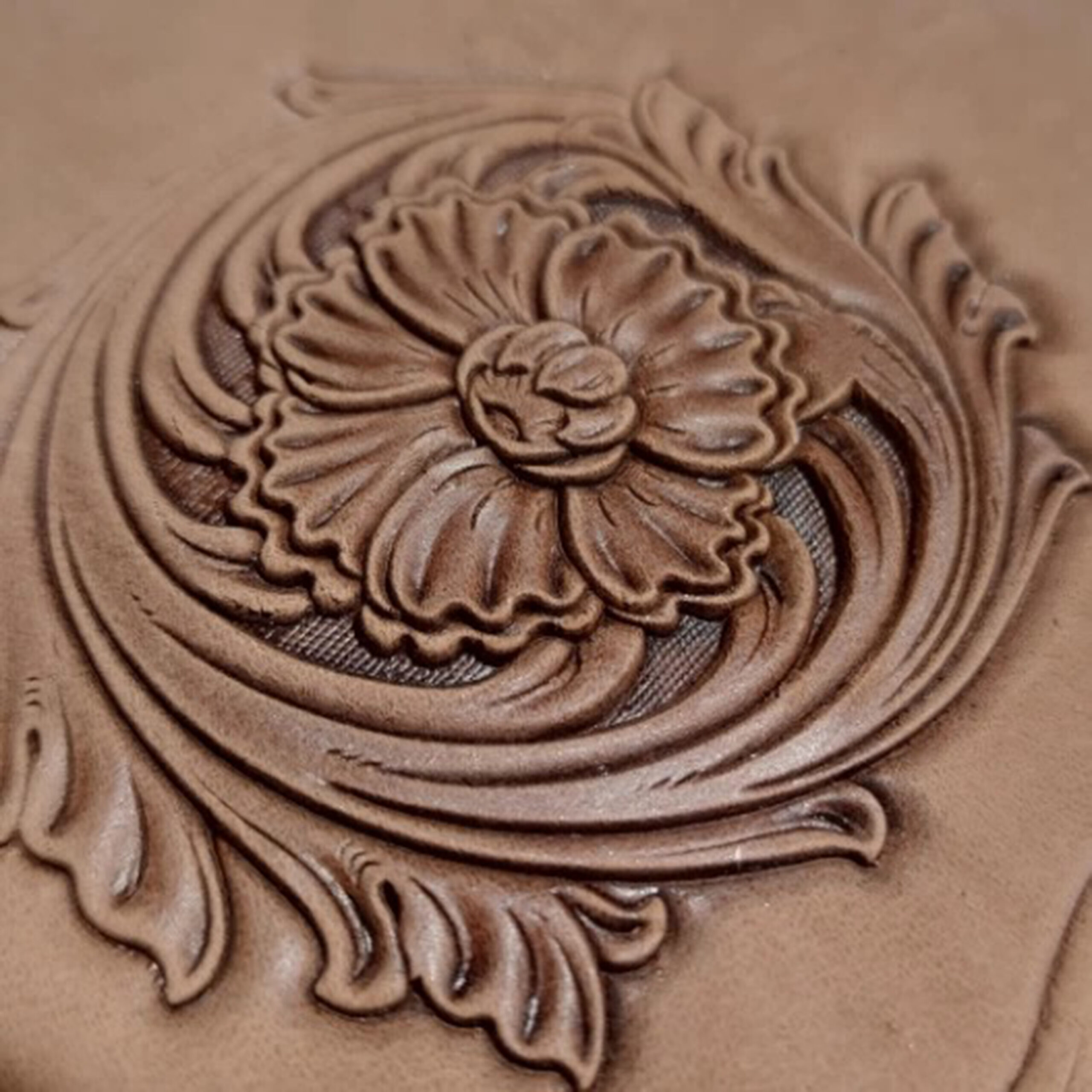 Corner floral leather stamp mold with embossed vegetable-tanned leather sample