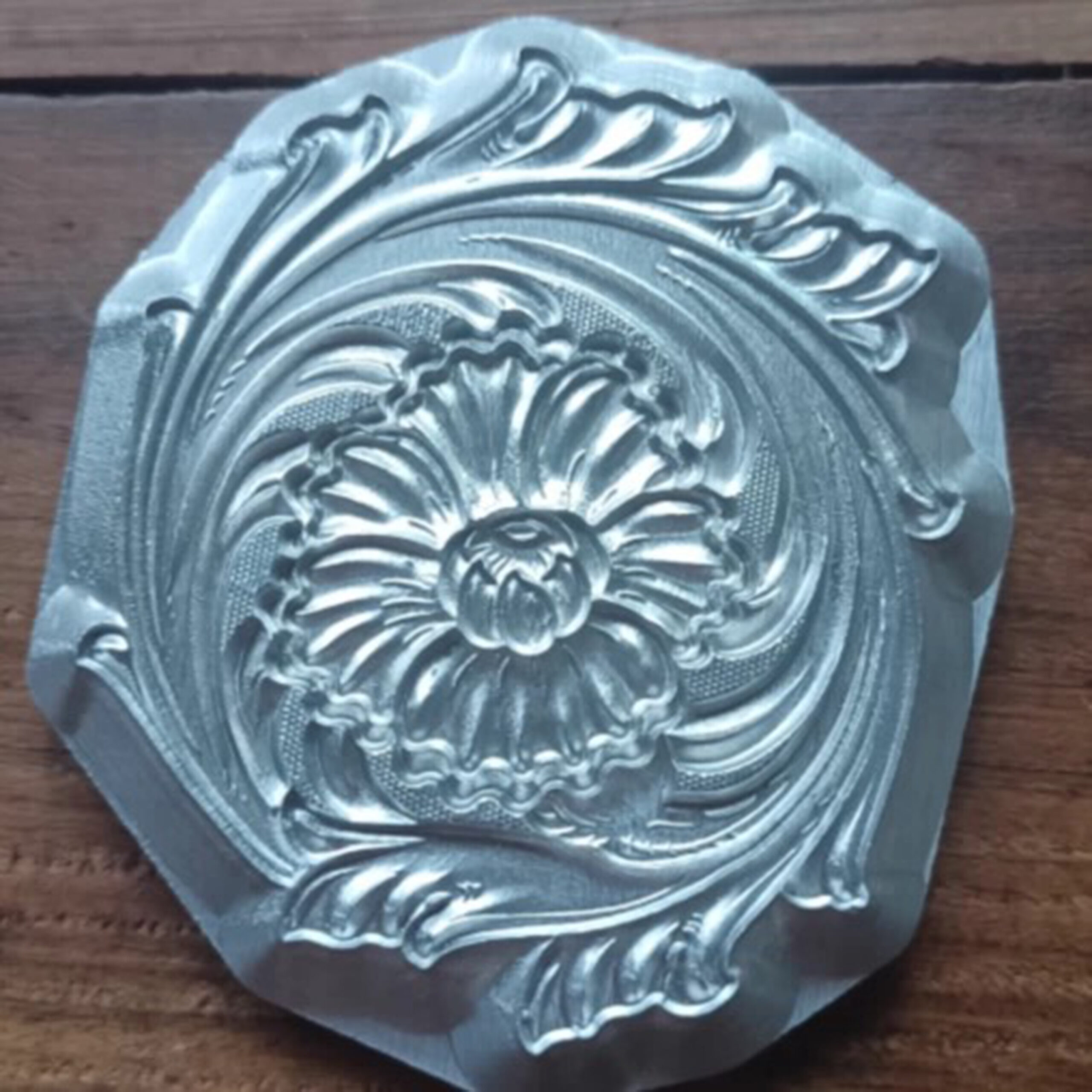 Corner floral leather stamp mold with embossed vegetable-tanned leather sample