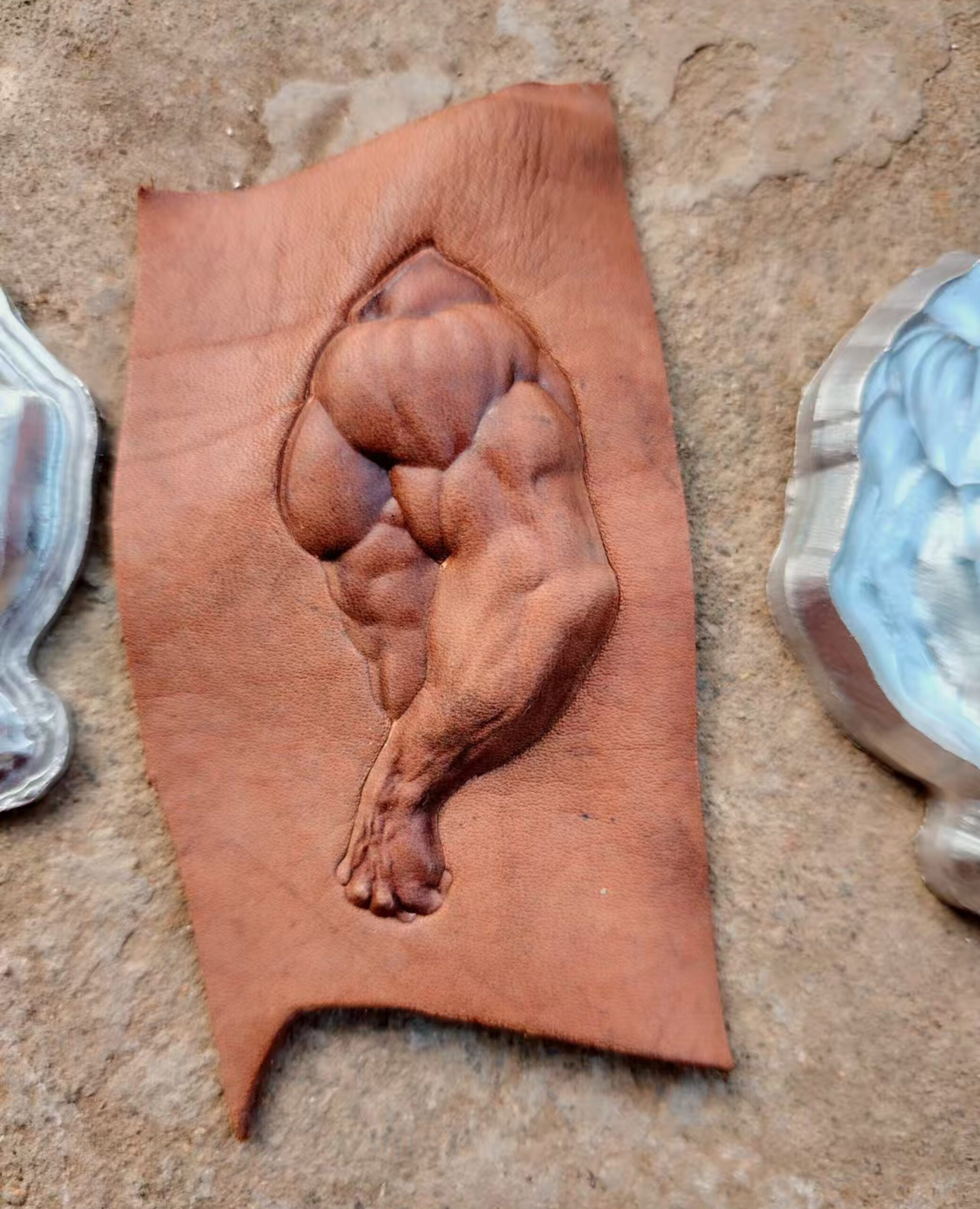 Muscle Man leather stamp mold impressions on real leather