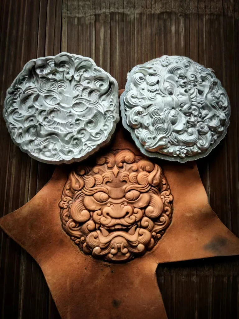 Stereo lion leather stamp mold on leather sample