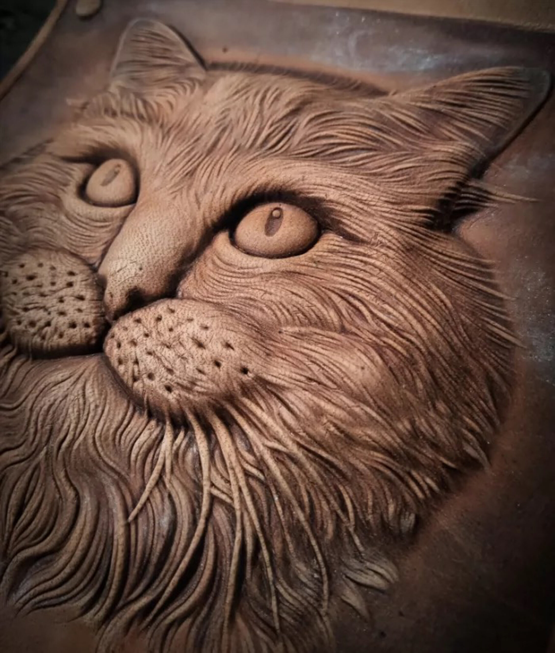 Cat leather stamp mold impression on real leather