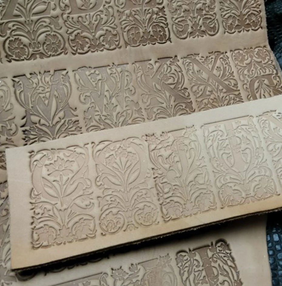 floral alphabet leather stamp impression on vegetable tanned leather