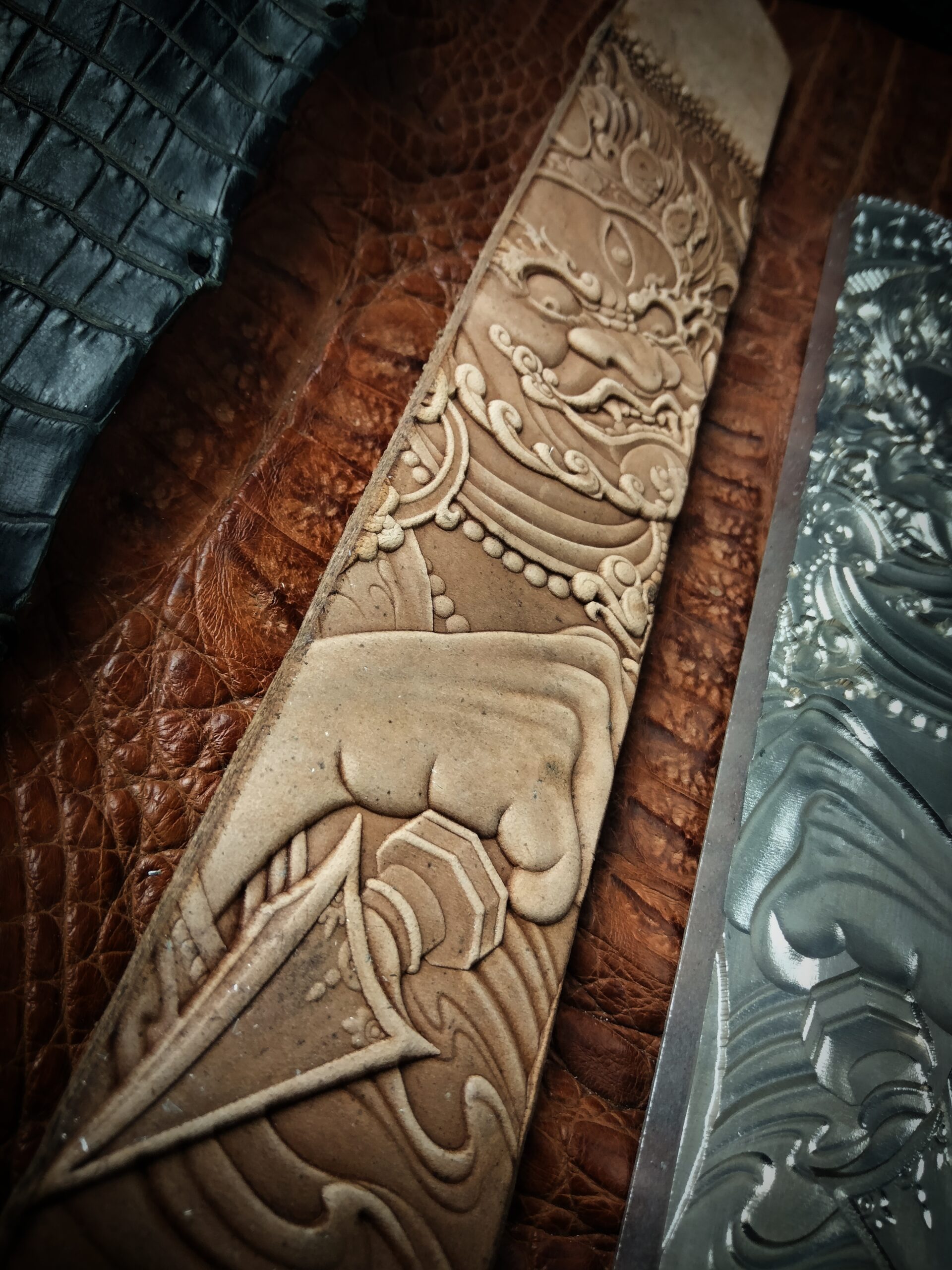 close up of vintage zhongkui leather stamp mold detail