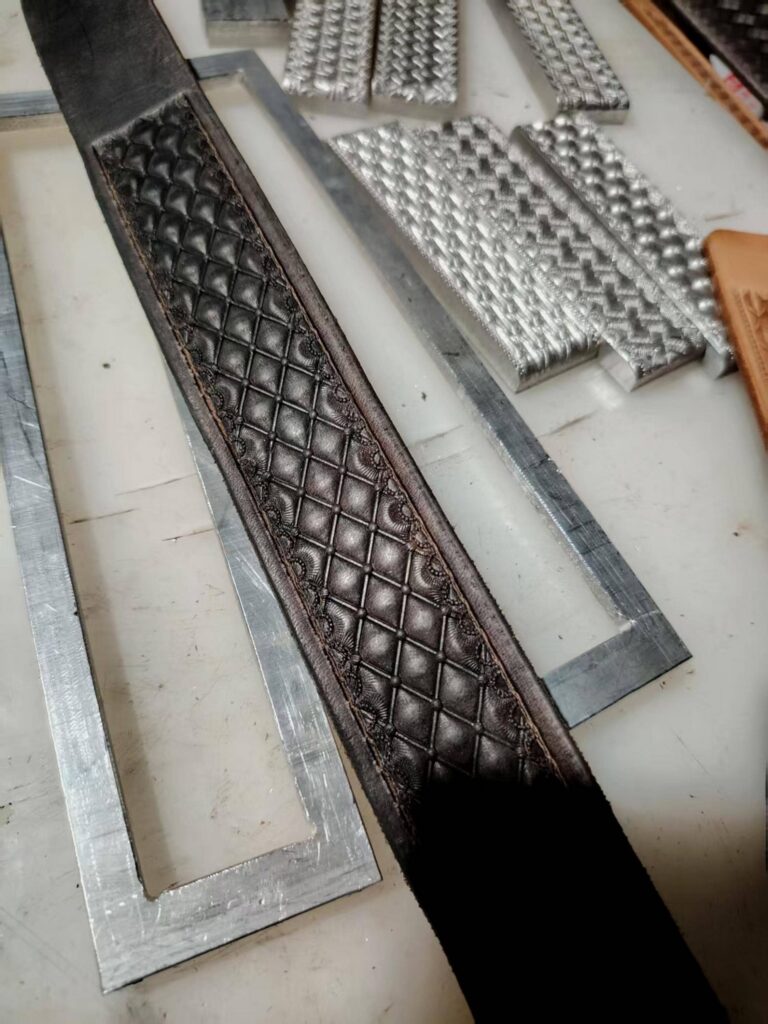 Geometric leather belt embossing mold E with pressed leather pattern